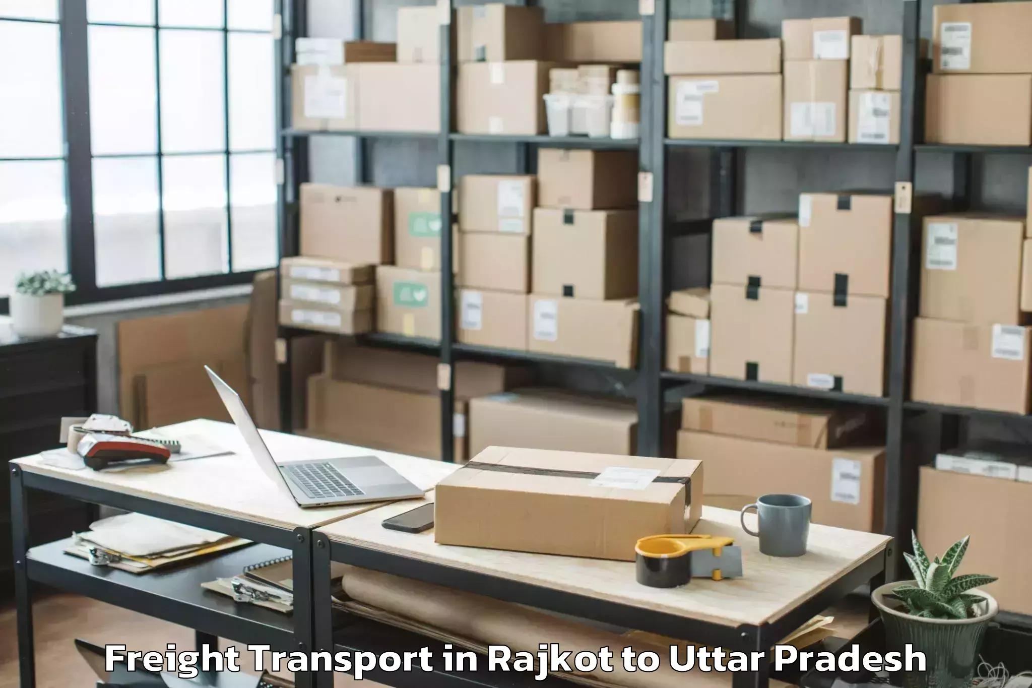 Top Rajkot to Belthara Road Freight Transport Available